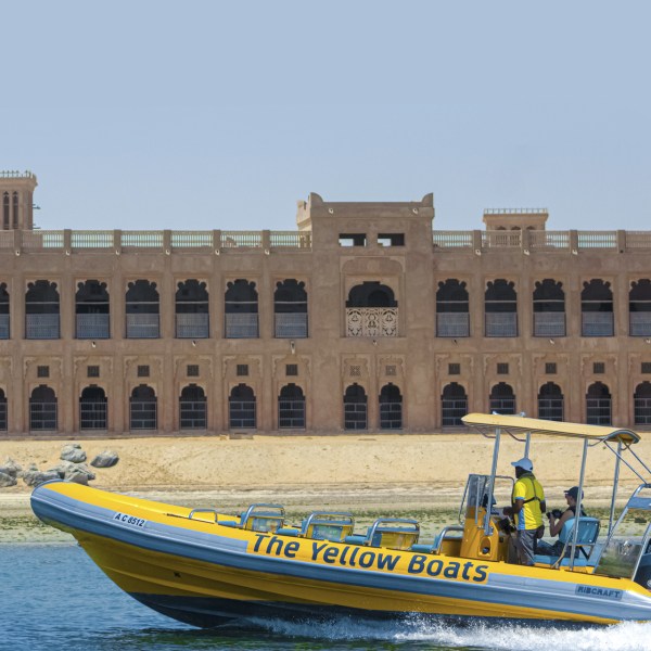 a boat sitting on top of a building